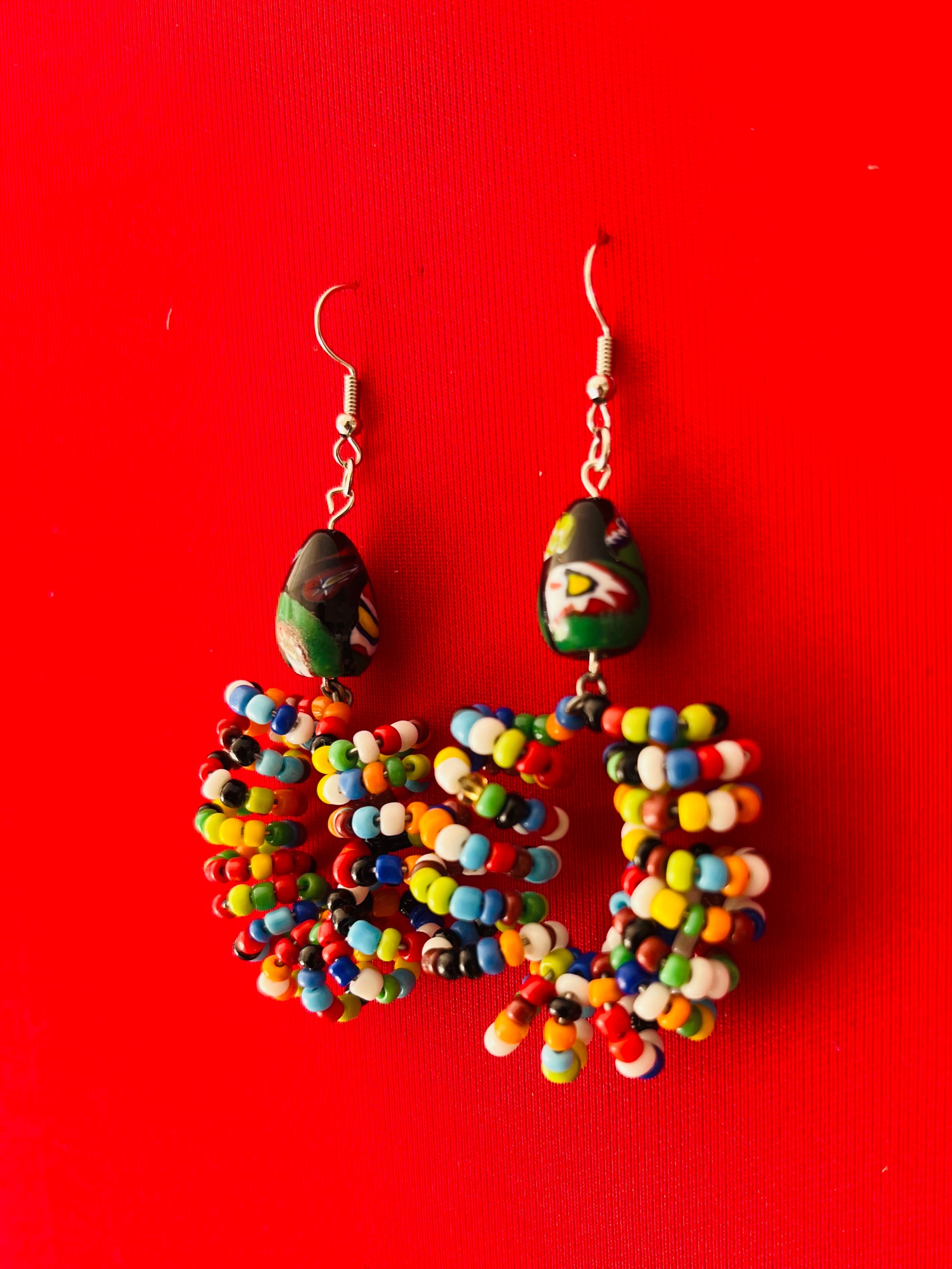 Handmade beaded earrings featuring layered beadwork and a delicate, lightweight finish. 