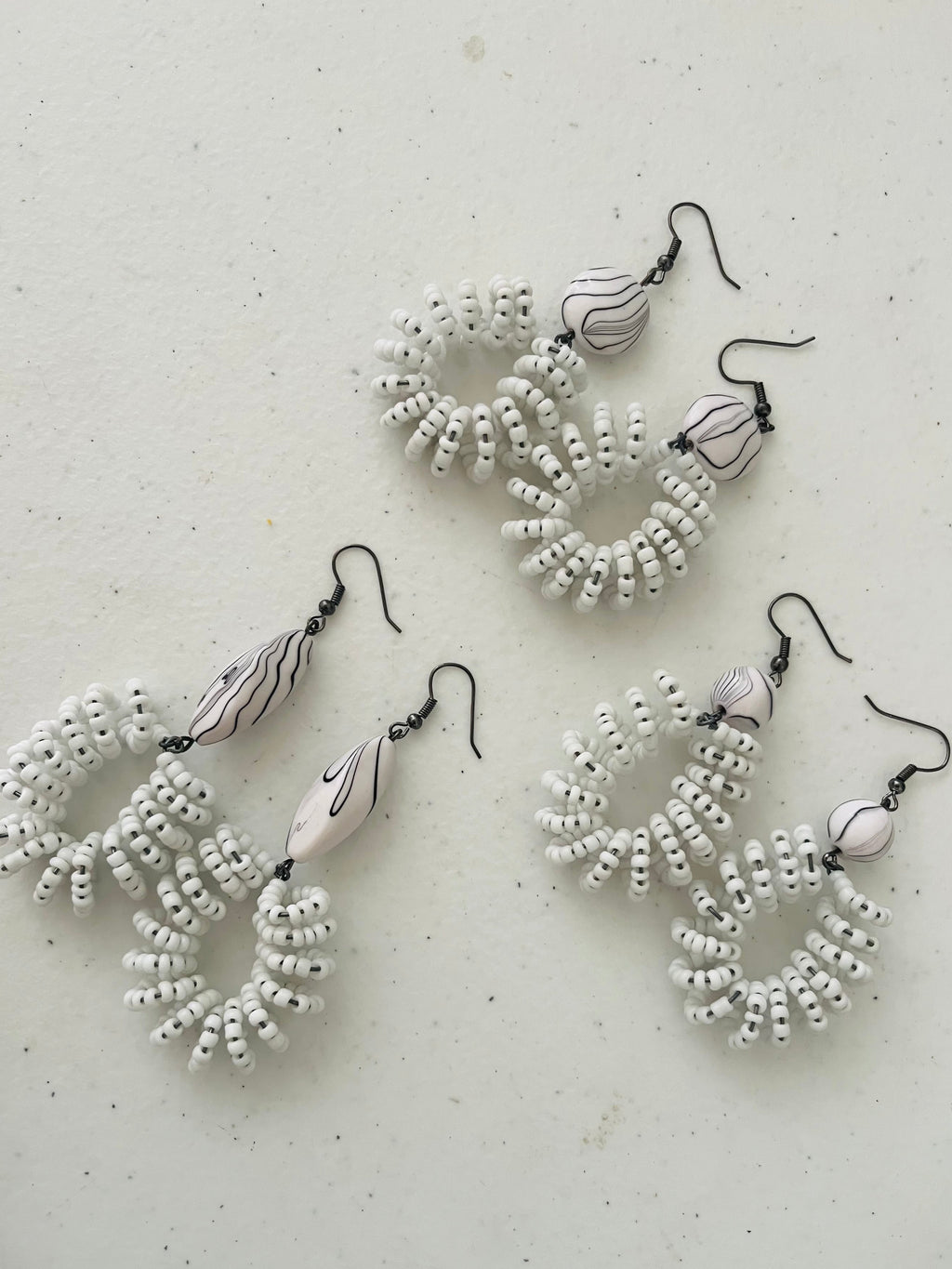 Spiral Bead Earrings (white) with Round Accent - R170.00