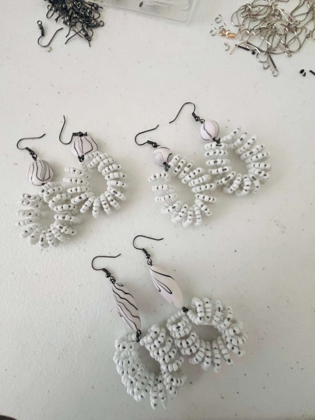 Spiral Bead Earrings (white) with Long Accent - R170.00