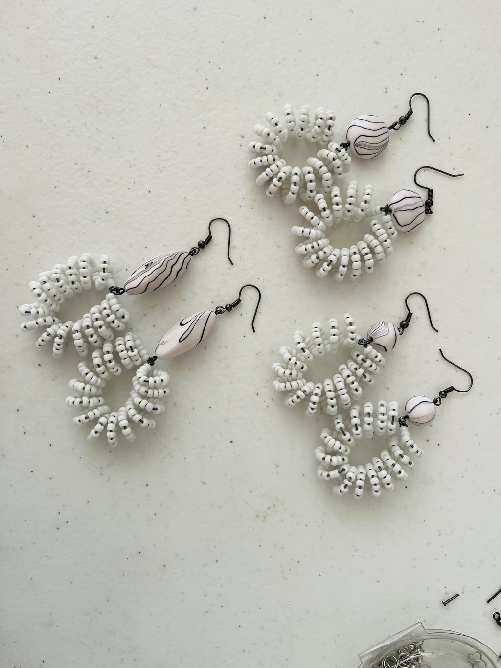 Spiral Bead Earrings (white) with Round Flat Accent - R170.00